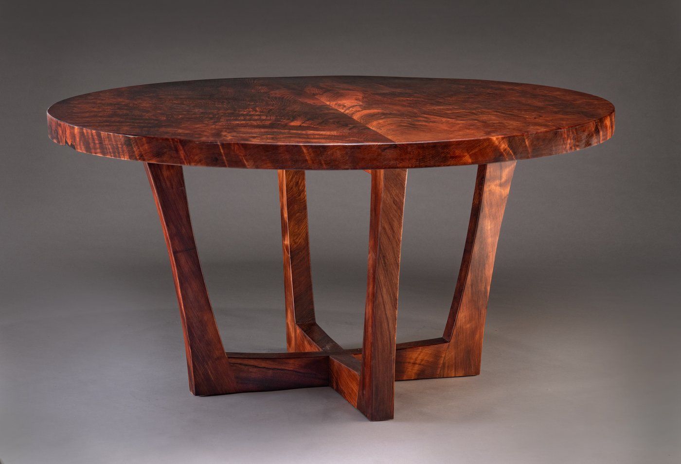 The Sempervirens Table: round dining table in salvaged old growth coast redwood with a hand shaped pedestal base