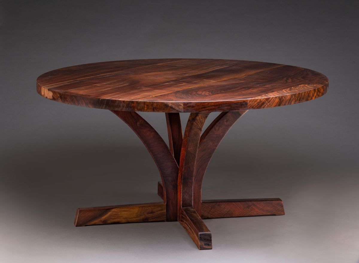Round pedestal dining table in figured claro walnut, available now from Trumanmade